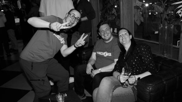 Kuberoke orga team smiling into the camera